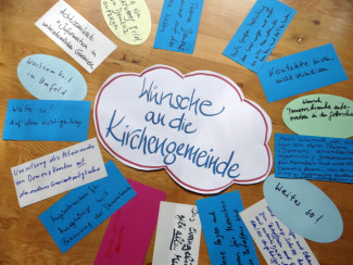 Zettelsonne mit Ideensammlung "Wünsche an die Kirchengemeinde"
